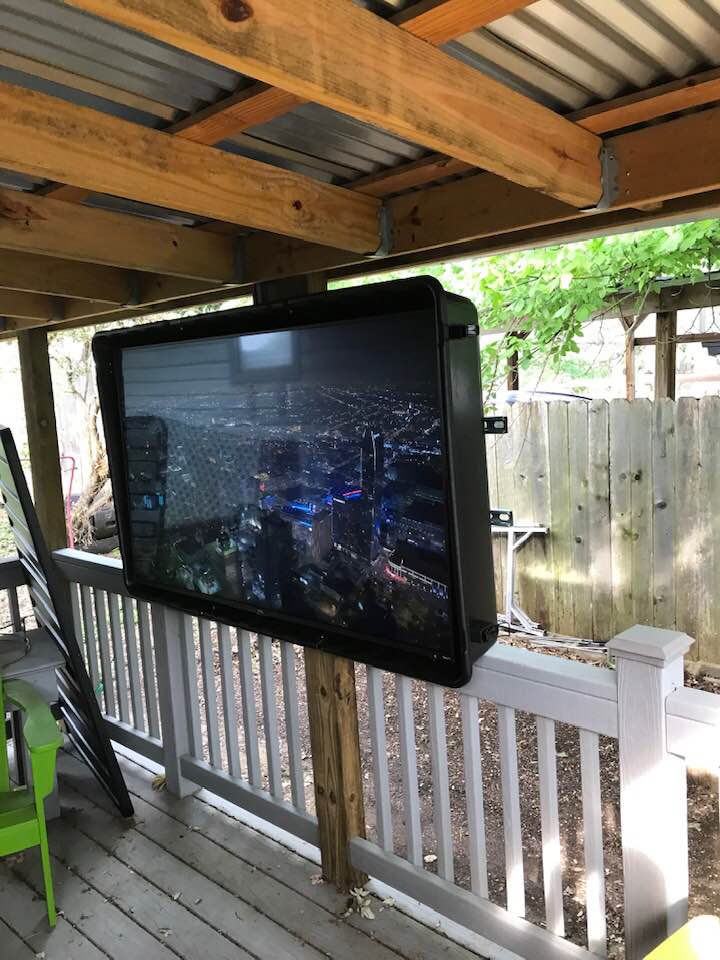 Outdoor TV with storm shelter
